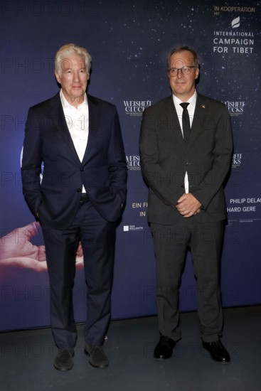 Richard Gere and Kai Müller (managing directors of International Campaign for Tibet) at a photo call in front of the presentation of the documentary about the life of the Dalai Llama, WISDOM OF HAPPINESS whose executive producer he is, at the Kulturbrauerei in Berlin on 24.10.2025