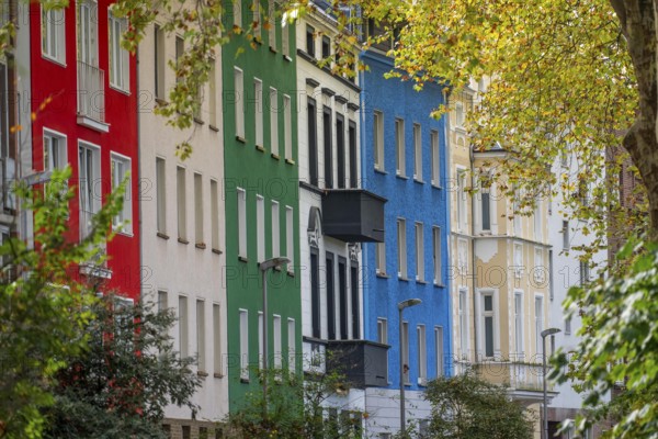 Residential buildings in Düsseldorf-Bilk, facades with different colors, rental apartments, past, North Rhine-Westphalia