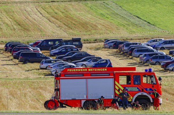 The Metzingen fire department is on standby as part of an air show on Rossfeld in Metzingen-Glems, Baden-Württemberg, Germany, for editorial use only