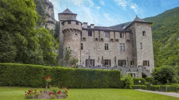 View of Hotel Chateau De La Caze in Gorge du Tarn Gorge, Sainte-Enimie, Gorges du Tarn Causses, Lozère Department, Occitanie Region, France