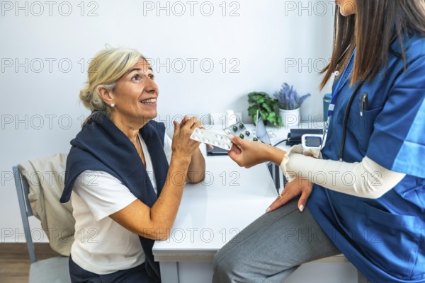 Medical professional giving a blister pack of pills to an elderly woman during a consultation, explaining treatment and promoting health awareness in a clinic setting