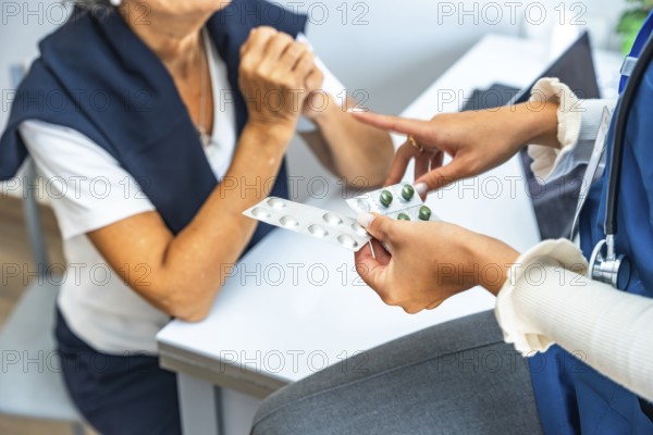 Healthcare professional explaining prescribed medication to an elder patient, discussing dosage and treatment plan during a medical consultation in a clinic, focusing on wellness and healthy living