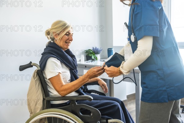 Medical professional checking a senior woman's blood pressure while she is sitting in a wheelchair, providing healthcare and support in a clinic environment