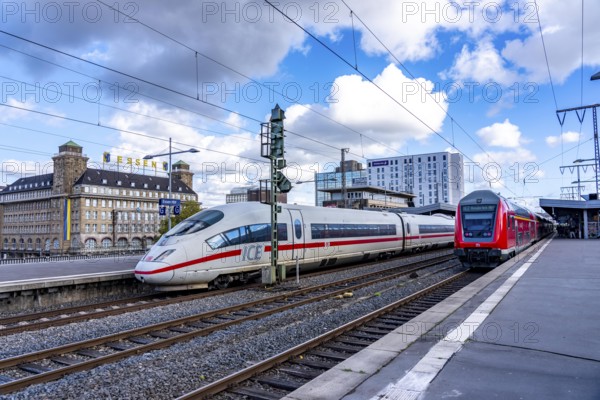 ICE train on track 2 in Essen main station, regional express, view of the city center, Handelshof building with Essen logo, North Rhine-Westphalia, Germany