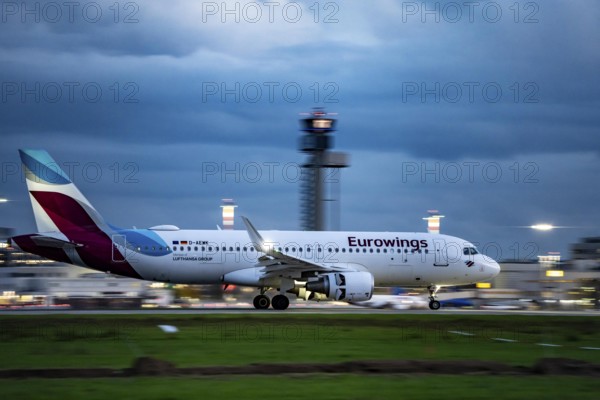 Eurowings Airbus A320 landing at Düsseldorf Airport, North Rhine-Westphalia, Germany