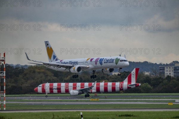 Condor aircraft landing and waiting for takeoff at Düsseldorf Airport, North Rhine-Westphalia, Germany