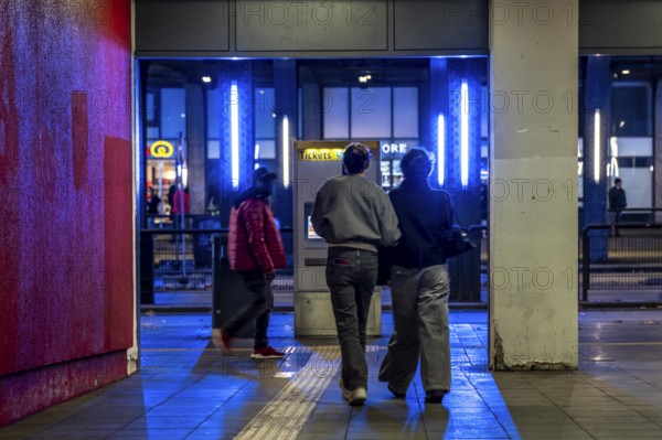 Underpass at Essen Central Station, away from the platforms to the public transport buses below the tracks, dark even on bright days, North Rhine-Westphalia, Germany