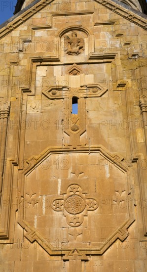 Detailed view of an artistic stone relief work with religious symbols on a church wall, Noravank monastery, Surb Astvatsatsin mausoleum church, Noravank, Vayots Dzor province, Wajoz Dzor, Armenia, Caucasus