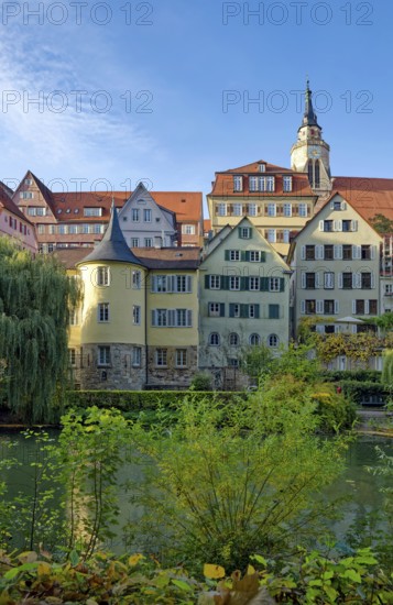 Hölderlin Tower, the poet Johann Christian Friedrich Hölderlin lived in the tower room, historic houses on the Neckar front, the Neckar river with poking and water reflection, old town of Tübingen, Baden-Württemberg, Germany