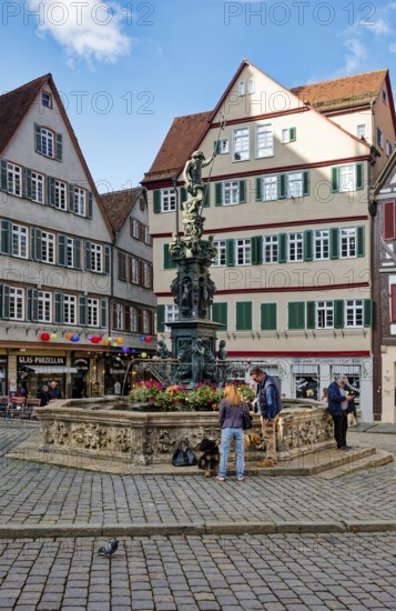 Market square with Neptune fountain with Neptune and trident from the Renaissance, Tübingen, Baden-Württemberg, Germany