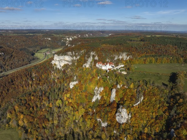 Aerial view of Wildenstein Castle near Leibertingen, surrounded by autumn vegetation, Upper Danube Valley, Sigmaringen district, Baden-Württemberg, Germany