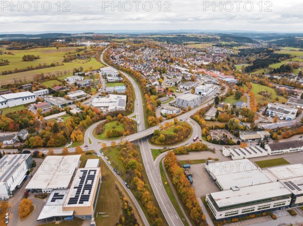 City panorama with street and buildings in autumn colors seen from a bird's eye view, Dornstetten, Freudenstadt district, Germany