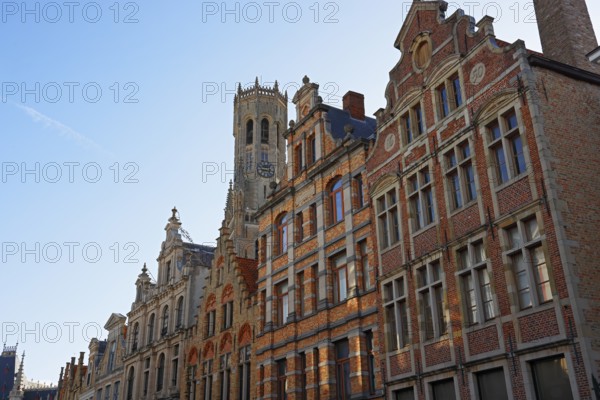 Historic houses in the old town of Bruges with belfry behind it, UNESCO World Heritage Site, Flanders, Belgium