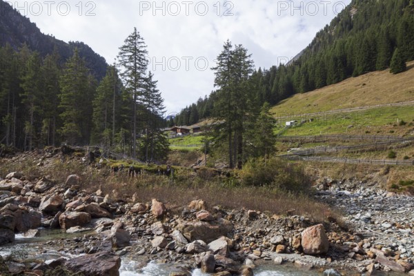 Ruetz river with Grawa-Alm on the Wilde Wasser Weg in autumn, WildeWasserweg, Stubai Valley, Tyrol, Austria