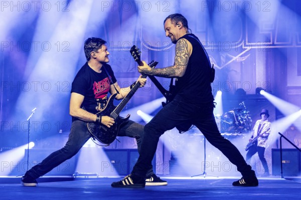 Flemming C. Lund (live guitarist) and Michael Poulsen (singer and guitarist) from Volbeat as part of the Greatest Of All Tours Worldwide 2025 at the ZAG Arena in Hanover on 21.10.2025