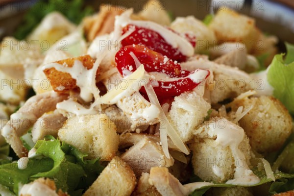 Classic Caesar salad, close-up, natural light, selective focus, horizontal