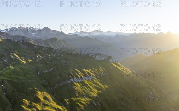 Sunrise, alpine panorama, aerial view with summit of Großvenediger, Venediger Group and Lasörling Group, Hohe Tauern, Austria