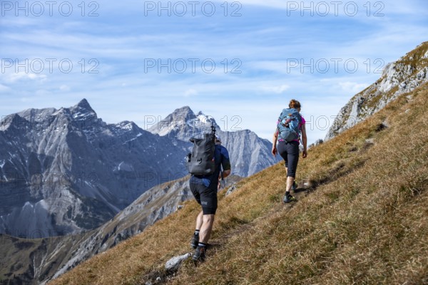Two hikers on hiking trail, hiking to Gamsjoch, eastern Karwendel, Tyrol, Austria