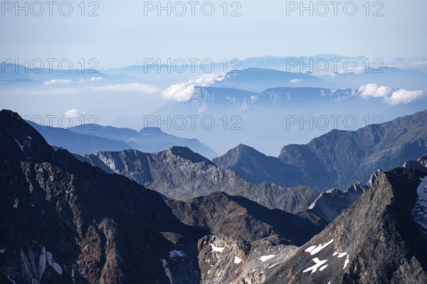 Rocky mountain landscape with snow-capped peaks and clear views, Hohe Tauern National Park, Carinthia, Austria