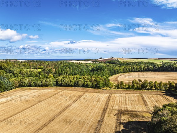 Farms and Fields over Ayton Castle from a drone, Ayton, Eyemouth, Scottish Borders, Scotland, UK