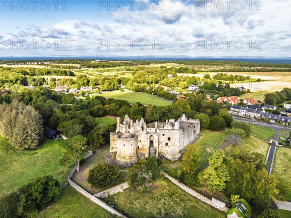 Ruins of Dirleton Castle & Gardens from a drone, Dirleton, East Lothian, Scotland, UK
