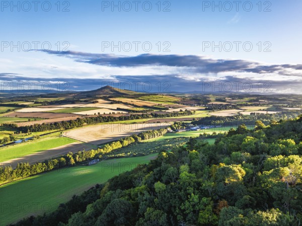 Fields and Farms over River Teviot and Minto Crags from a drone, Roxburghshire, Scottish Borders, Scotland, UK
