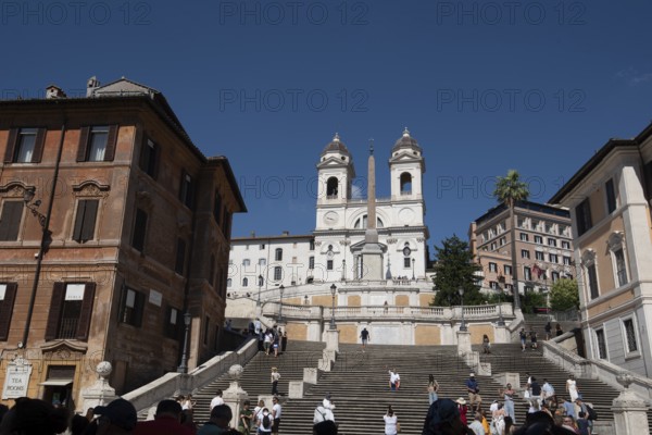 Spanish steps leading up to Trinità dei Monti church, obelisk in the middle, Rome, Italy