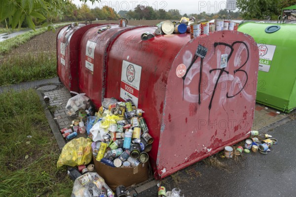 Overfilled can containers, Eckental, Middle Franconia, Bavaria, Germany