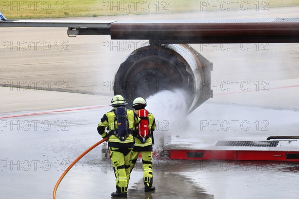 Stuttgart Airport Fire Department is practicing emergencies on a state-of-the-art simulator. Emergency service extinguish fire