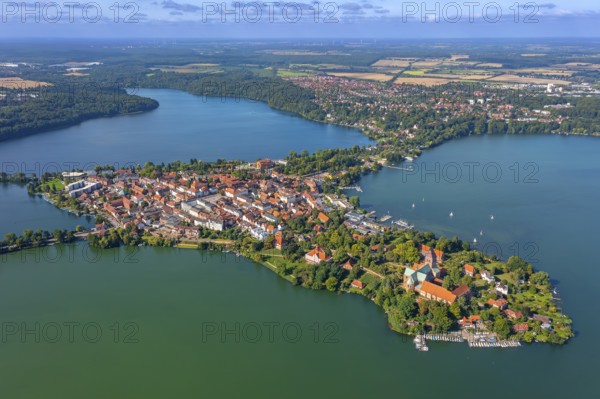Aerial view over Ratzeburger Dom, late Brick Romanesque cathedral in the town Ratzeburg and the Ratzeburger See in summer, Schleswig-Holstein, Germany