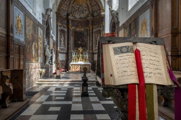 Lectern with hymn book in choir of the John the Evangelist church at 12th century Premonstratensian Park Abbey at Heverlee, Flemish Brabant, Belgium