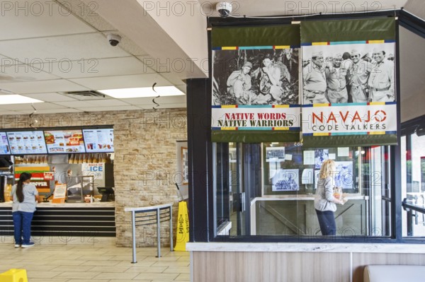 Kayenta, Arizona - Part of a Navajo Code Talker display inside a Burger King restaurant on the Navajo Nation. The U.S. military used Navajo men to transmit messages in their language during World War II. The restaurant is owned by the son of an original Code Talker