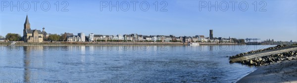Panoramic photo with view of west bank of Rhine on silhouette of city of Emmerich on the east bank, Lower Rhine, Emmerich, North Rhine-Westphalia, Germany