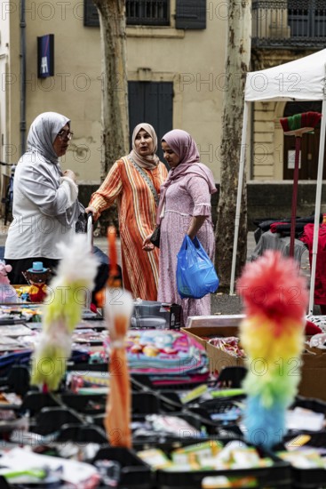 Goods, market, woman with headscarves, customers, Arles, France
