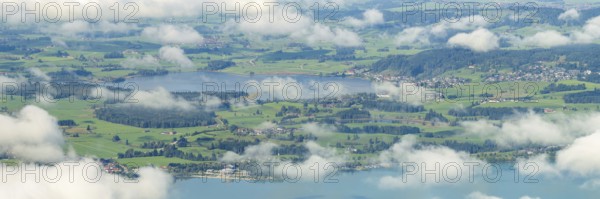 Panorama from Tegelberg, 1881m, of Hopfensee, in front of Lake Forggensee, Ostallgäu, Bavaria, Germany