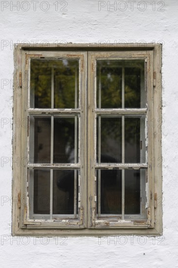 Old, slightly weathered window in a white wall, Weinviertel Lower Austria