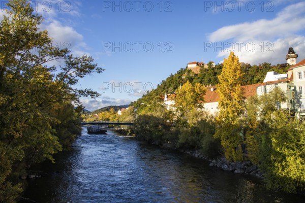 Murinsel, behind Schlossberg with clock tower, Graz, Styria, Austria