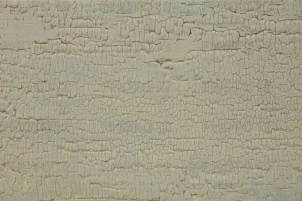 Abstract closeup surface view of old paint cracked on a wall, Suomusjärvi kirkonkylä, Finland