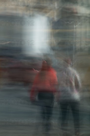 Abstract women waiting for traffic lights to change captured using ICM intentional camera movement technique, Helsinki, Finland