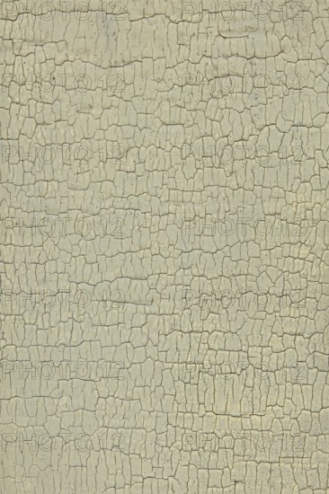 Abstract closeup surface view of old paint cracked on a wall, Suomusjärvi kirkonkylä, Finland