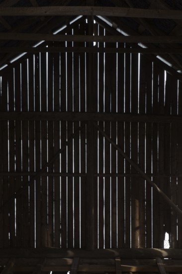 Silhouette of barn wall boards from inside, Junkarsborg, Finland