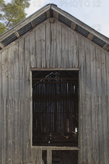 Entrance to a abandoned wood barn, Junkarsborg, Finland
