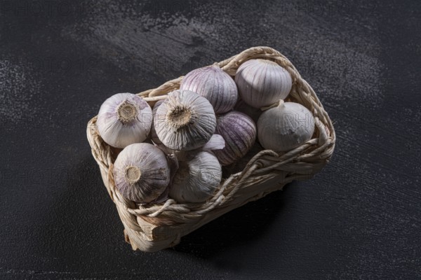 Elephant garlic on dark kitchen plate