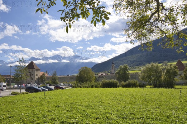 The small town of Glurns has a completely preserved city wall. It is surrounded by mountains and is located in the beautiful Vinschgau Valley in Italy