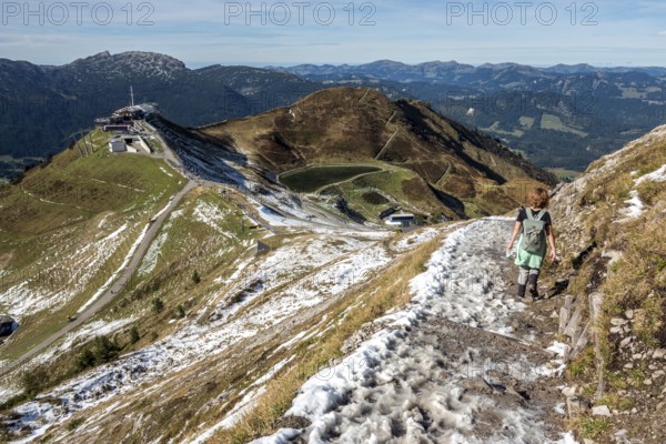 Female hiker on hiking trail below the Kanzelwand, back left Kanzelwandbahn mountain station, Kleinwalsertal, Vorarlberg, Allgäu Alps, Austria