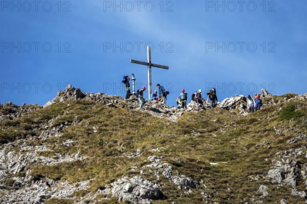 Summit of the Kanzelwand with summit cross and people, Allgäu Alps, Allgäu, Vorarlberg, Austria