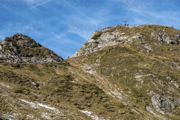 Behind the summit of the Kanzelwand with summit cross and people, Allgäu Alps, Allgäu, Vorarlberg, Austria