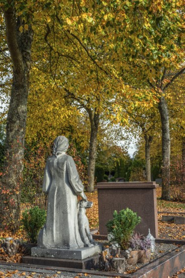 Female figure as a tombstone on a grave in Ystad, Skåne County, Sweden, Scandinavia