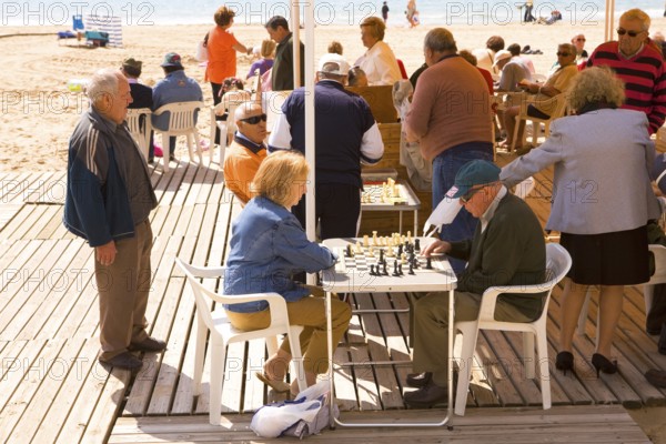 Social game, seaside promenade, Benidorm, Spain