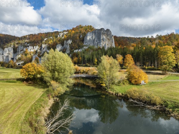 Aerial view of the Upper Danube Valley near Thiergarten surrounded by autumn vegetation with raven rocks, climbing rocks, Jura limestone cliffs, Sigmaringen district, Baden-Württemberg, Germany